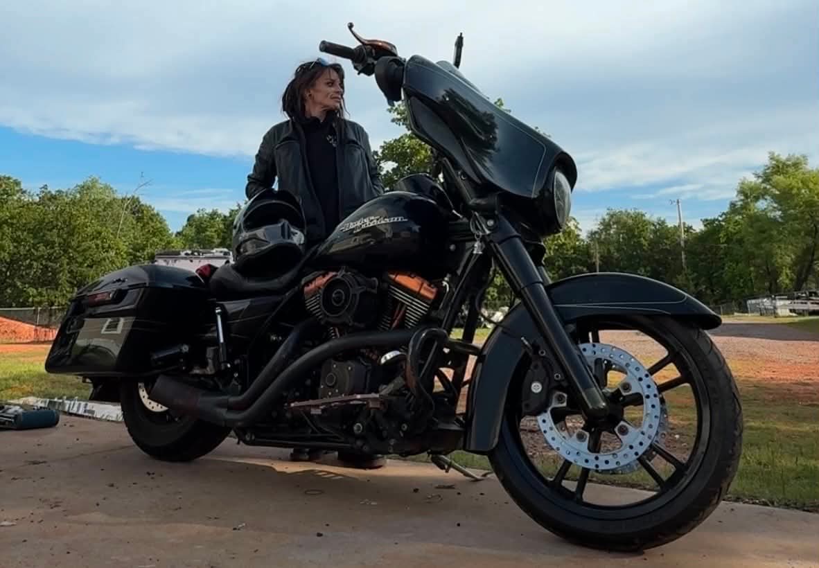 Autumn Rose with her motorcycle
